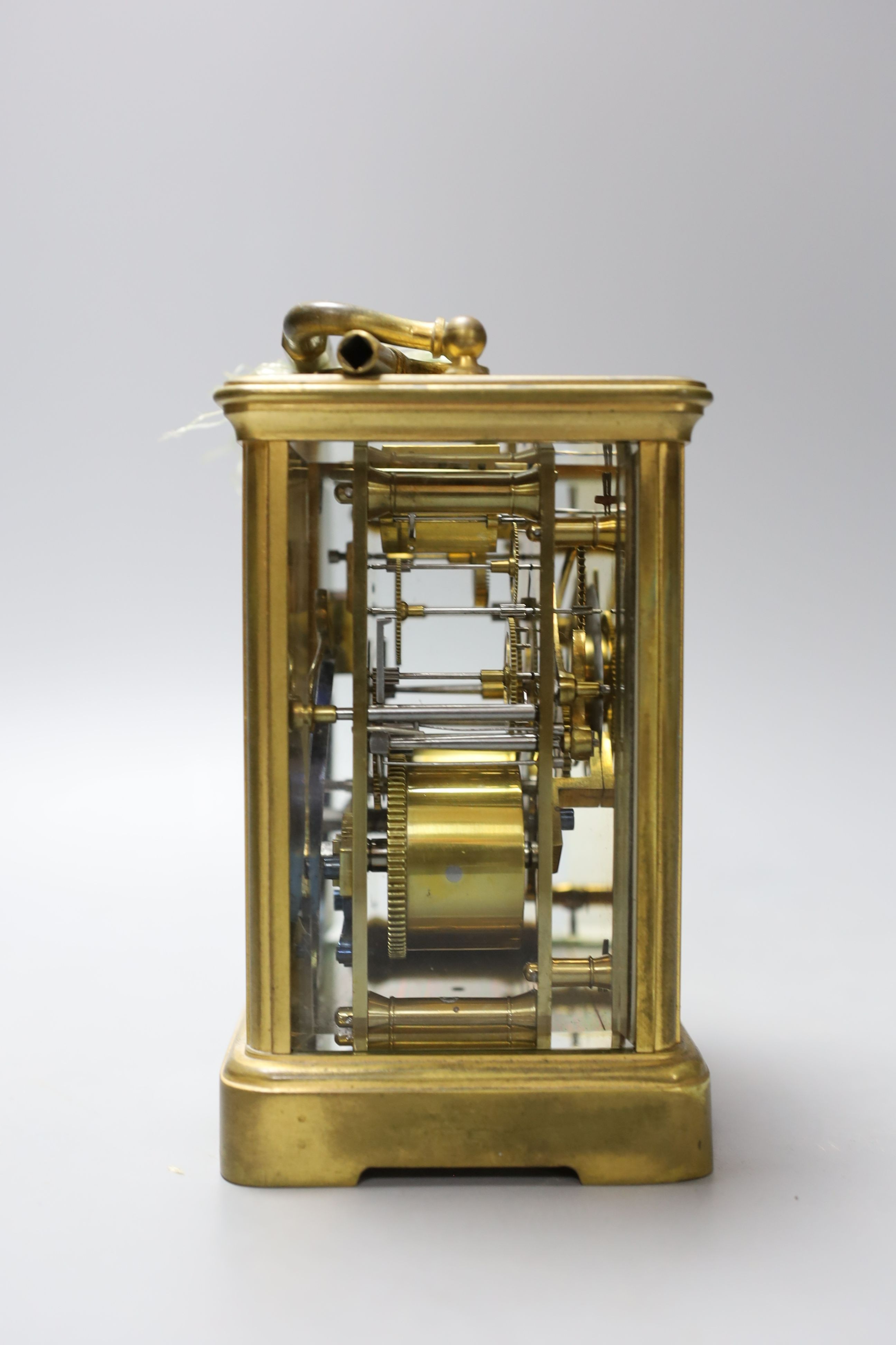 A leather cased brass carriage clock